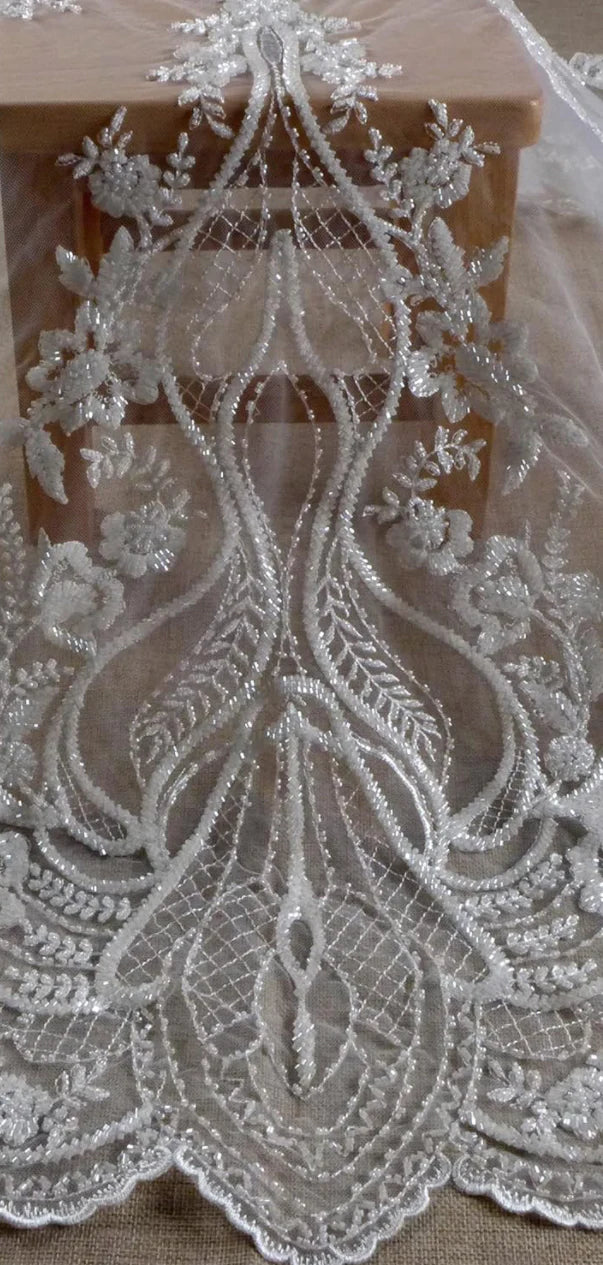 Off-Shoulder Mermaid Wedding Dress with Sweetheart Neckline and Floral Lace Detailing